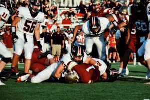 football players on field during daytime