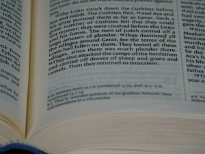 a close up of an open book on a table